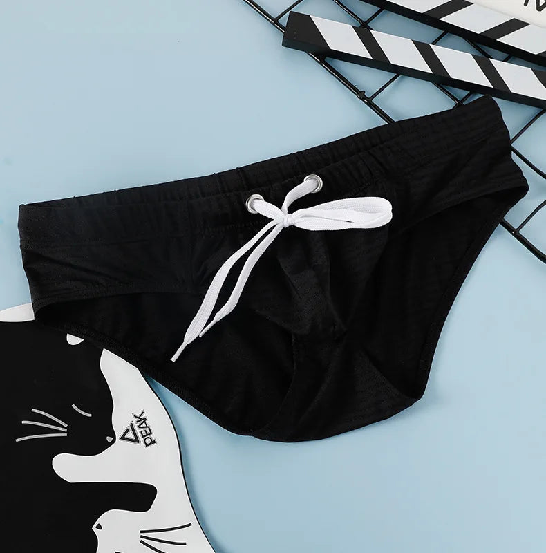 Men's Solid Color Swim Trunks Drawstring Slim Fit Anti-Slip, Quick-Dry Athletic Tight Sports Shorts Comfortable Swimming Bottoms