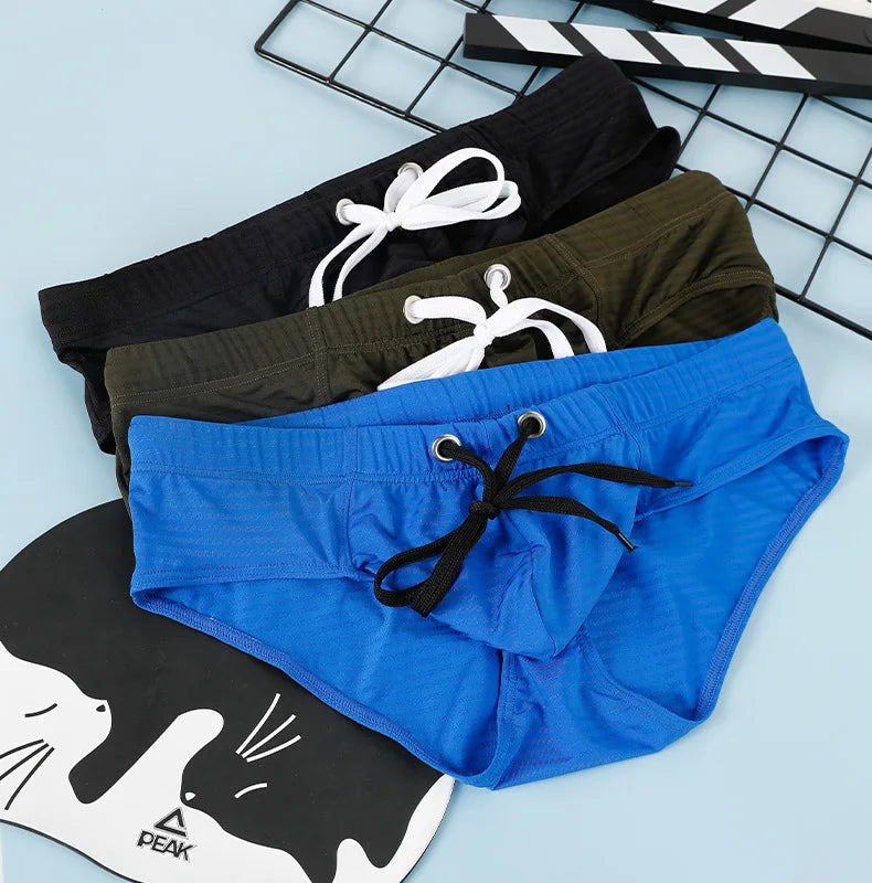 Men's Solid Color Swim Trunks Drawstring Slim Fit Anti-Slip, Quick-Dry Athletic Tight Sports Shorts Comfortable Swimming Bottoms