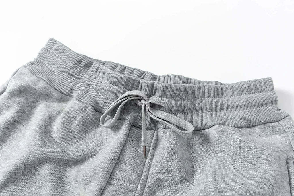 The latest trend in men's and women's sports pants is gothic streetwear, sporty and casual, fleece warm pants, and clothing