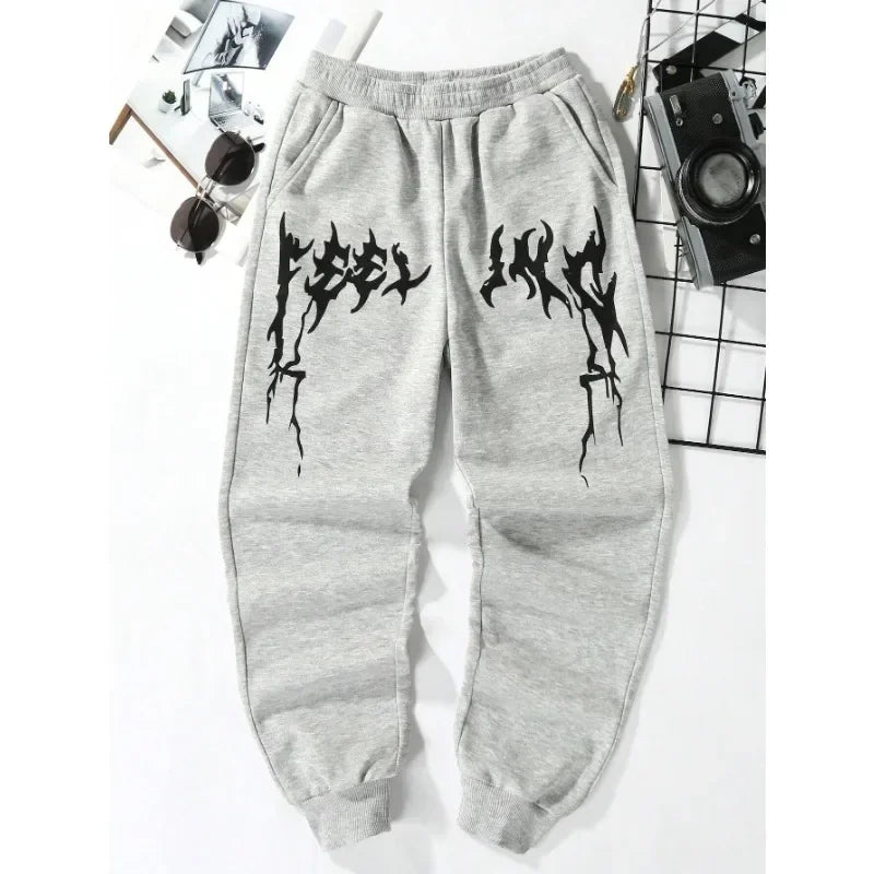 The latest trend in men's and women's sports pants is gothic streetwear, sporty and casual, fleece warm pants, and clothing